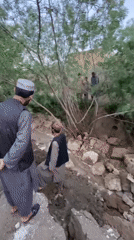 Flooding causes ground erosion damage in Kandahar residential area