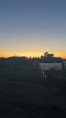 Evening scenes documented across Berezovka, Russia during sunset hours