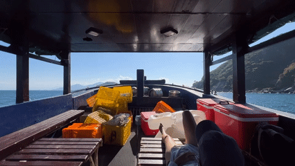 Fisher rests aboard working boat near Nha Trang coast