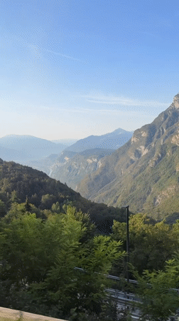 Morning drive through Fai della Paganella's mountain scenery