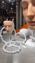 Hyper-realistic face art installation spotted in Tokyo's Minato City