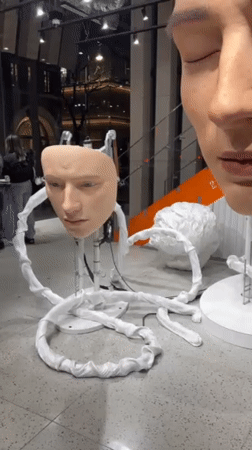 Hyper-realistic face art installation spotted in Tokyo's Minato City