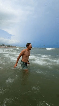 Swimming and shoreline moments at Rimini beach