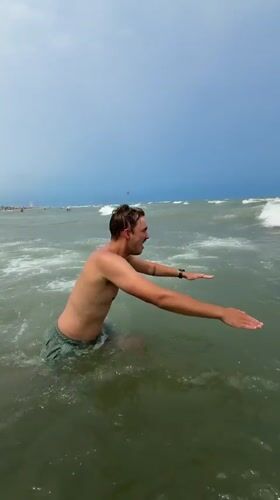 Swimming and shoreline moments at Rimini beach