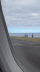 Passenger documents airport views during Santa Cruz Portugal flight