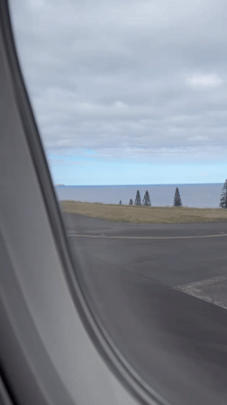 Passenger documents airport views during Santa Cruz Portugal flight
