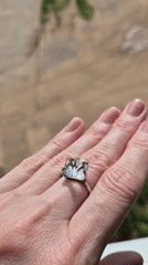 Jewelry pieces shown up close, rings to earrings to gold pins