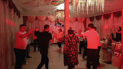 Dancing and drinks at a decorated social gathering