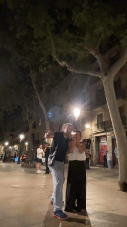 Late-night celebration captured in Barcelona town square