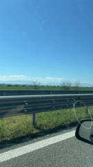 Highway travel documented near Orizovo, Bulgaria on sunny morning