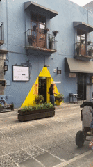 Evening street market bustling in historic Puebla district