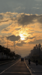 Morning commute captured during golden sunrise in Carmen, Philippines
