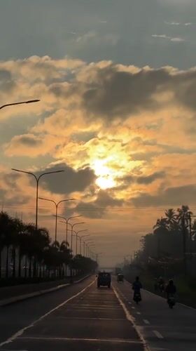 Morning commute captured during golden sunrise in Carmen, Philippines