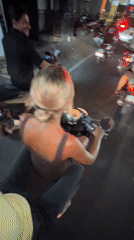 Scooter rider captures night street scene in North Kuta