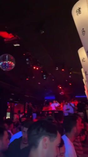 Late-night club scene in Sanxenxo, inside and out