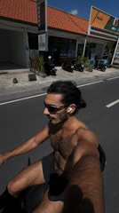 Shirtless scooter rider observed on North Kuta street