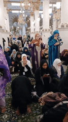Nighttime crowds gather at Prophet's Mosque in Medina