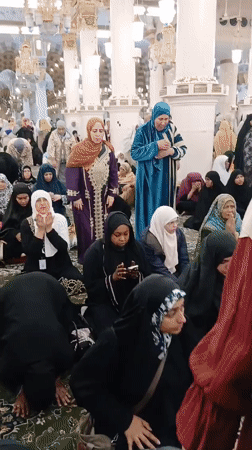Nighttime crowds gather at Prophet's Mosque in Medina