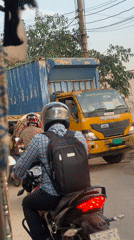 Street traffic and delivery activity observed in Dhaka