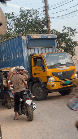 Street traffic and delivery activity observed in Dhaka