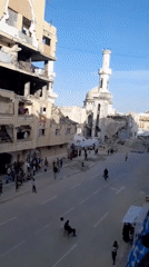 Residents gather in war-damaged Khan Yunis streets