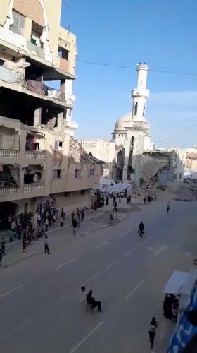 Residents gather in war-damaged Khan Yunis streets