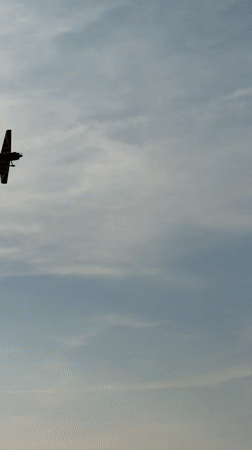 RC planes fly aerobatics at a model aviation meet in Becherbach