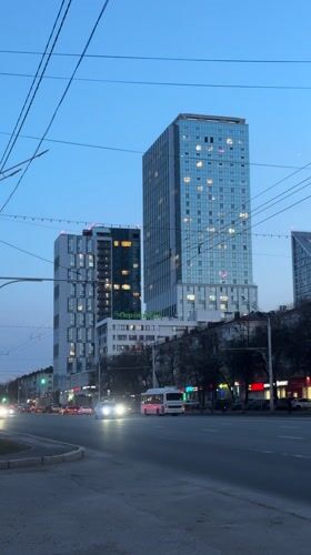 Evening traffic flows through central Ufa street