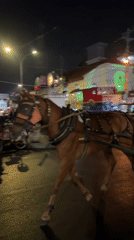 Malioboro Street buzzes with carriages, vendors, and night crowds