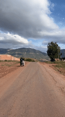 Motorcyclist documents rural road journey near Ouaouizert, Morocco