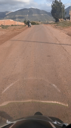 Motorcyclist documents rural road journey near Ouaouizert, Morocco