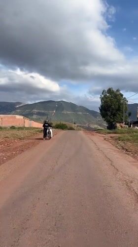 Motorcyclist documents rural road journey near Ouaouizert, Morocco