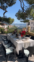 Outdoor dining setup captured in Šušanj, Montenegro