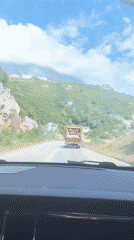 Driver encounters garbage truck after exiting tunnel in Montenegro