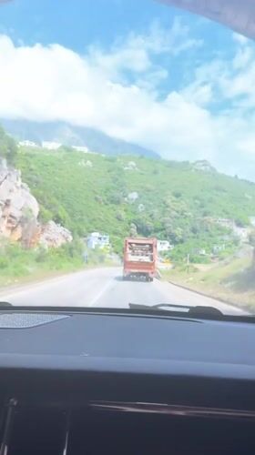 Driver encounters garbage truck after exiting tunnel in Montenegro