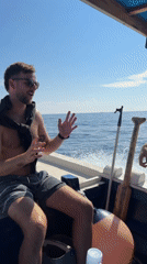 Three men spotted boating in Indonesian waters