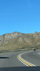 Driver records highway journey through Cape Town during midday
