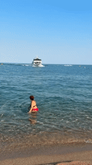 Dofi Jet ferry comes and goes off Blanes beach