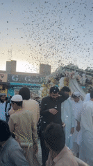 Outdoor celebration with confetti in Quetta, Pakistan