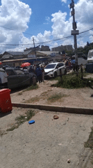 Crowd gathers on Nairobi street near commercial area