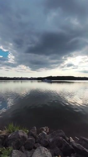 Afternoon life captured along Ternopil Lake waterfront in Ukraine