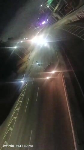 Nighttime urban scenes documented across Caracas highways and intersections