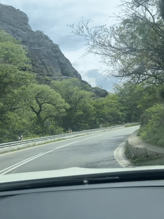 Morning traffic navigates mountain road near Rila Bulgaria