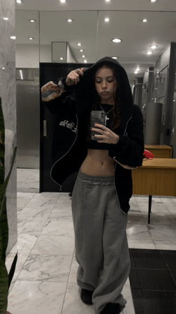 Young women photographed taking selfies in Buenos Aires building