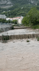 Muddy river flows through Donji Pobori, Montenegro dams