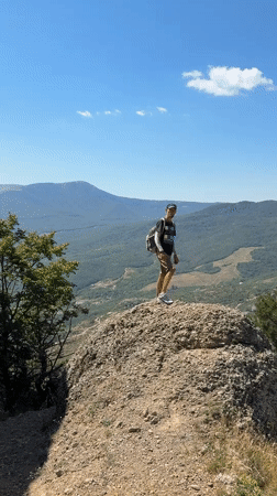 Rocky summit views across a sweeping Ukrainian mountain landscape