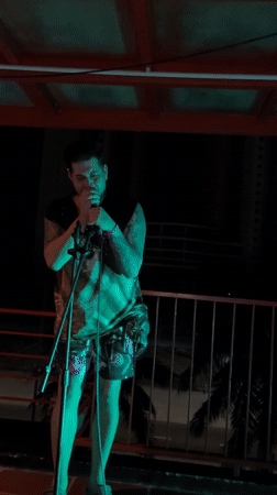 Street musician performs evening balcony concert in Da Nang