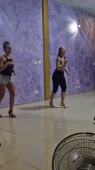 Dance session in a purple-walled studio