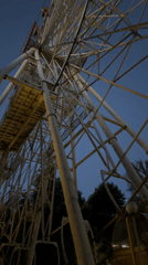 Evening at a Minsk amusement park, Ferris wheel in view