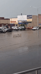 Street flooding strands cars in Kokshetau, Kazakhstan